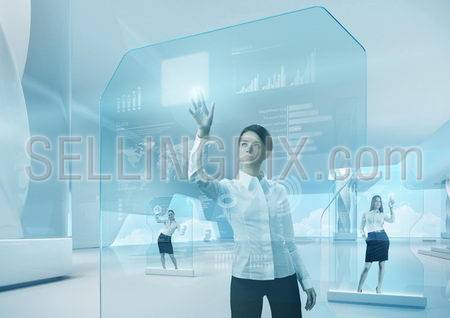 Future teamwork concept. Future technology touchscreen interface. Girl touching screen interface in hi-tech interior. Business lady pressing virtual button in futuristic office.