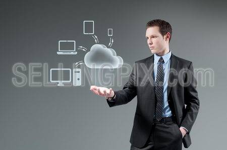 Cloud computing idea concept. Man holding cloud Hologram.