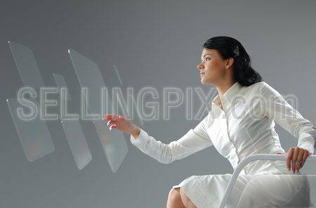 Future technology touchscreen interface. Girl touching transparent screen interface. Business lady pressing virtual copyspace button .