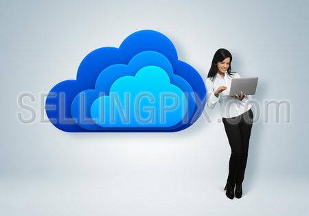 Cloud computing idea concept. Business woman stands by the cloud computing icon.