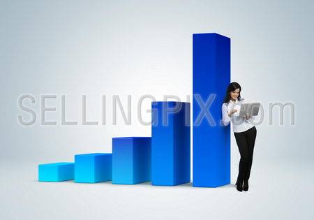 Financial report & statistics. Business success concept. Business woman with notebook stands by the bar graph.
