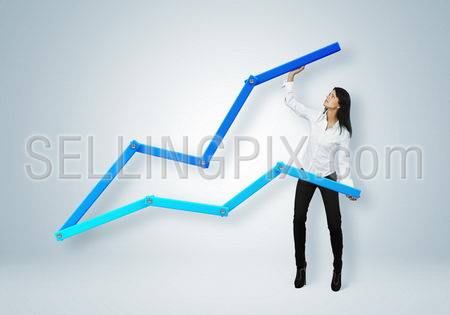 Financial report & statistics. Business success concept. Businesswoman helping chart arrow to go upward.