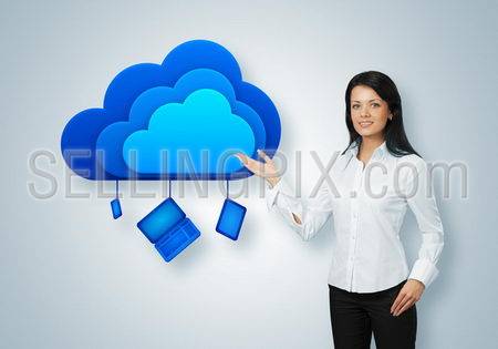 Cloud computing idea concept. Business woman points to the cloud computing icon with notebook, tablet pc and phone.
