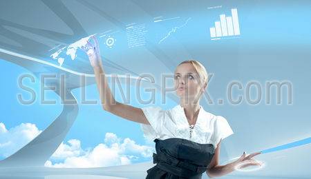 Attractive blonde touching the world map virtual future interface