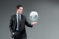 Man holding world globe Hologram. Future interface. Futuristic technology concept. Global business management.